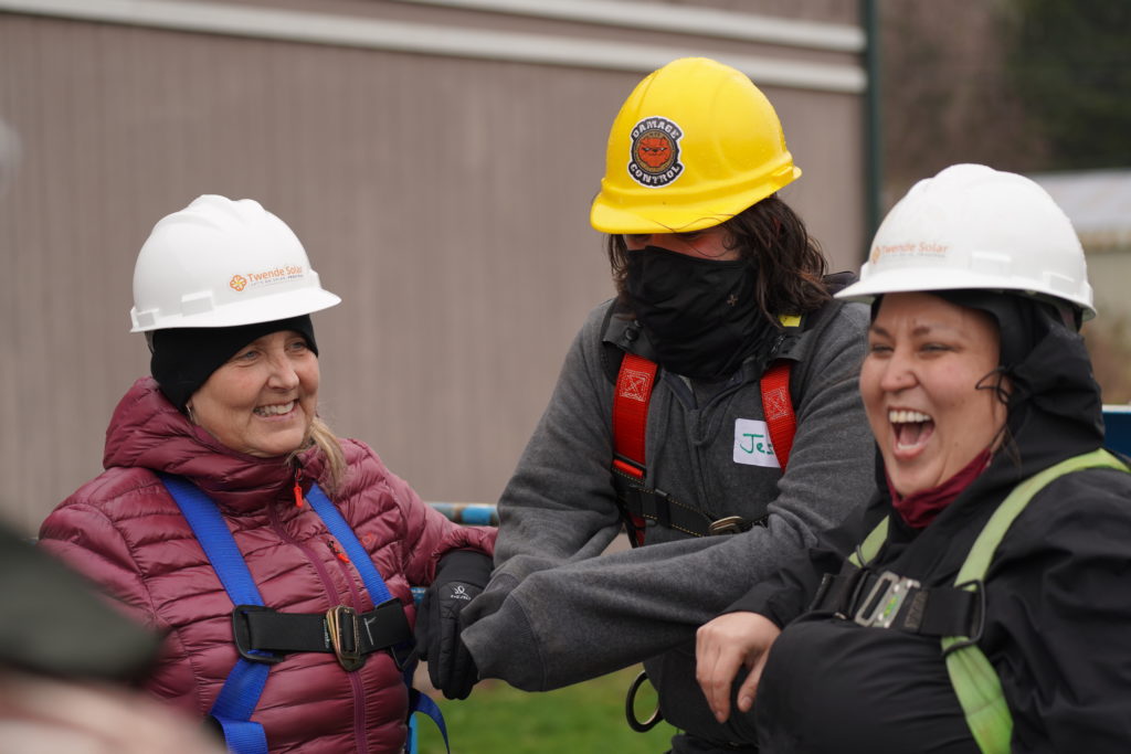 photo of workers at Quinault indian nation for solar panel installation.